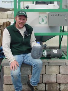 Lane Forest's First Employee Mark S. with His Cup of Morning Compost Tea